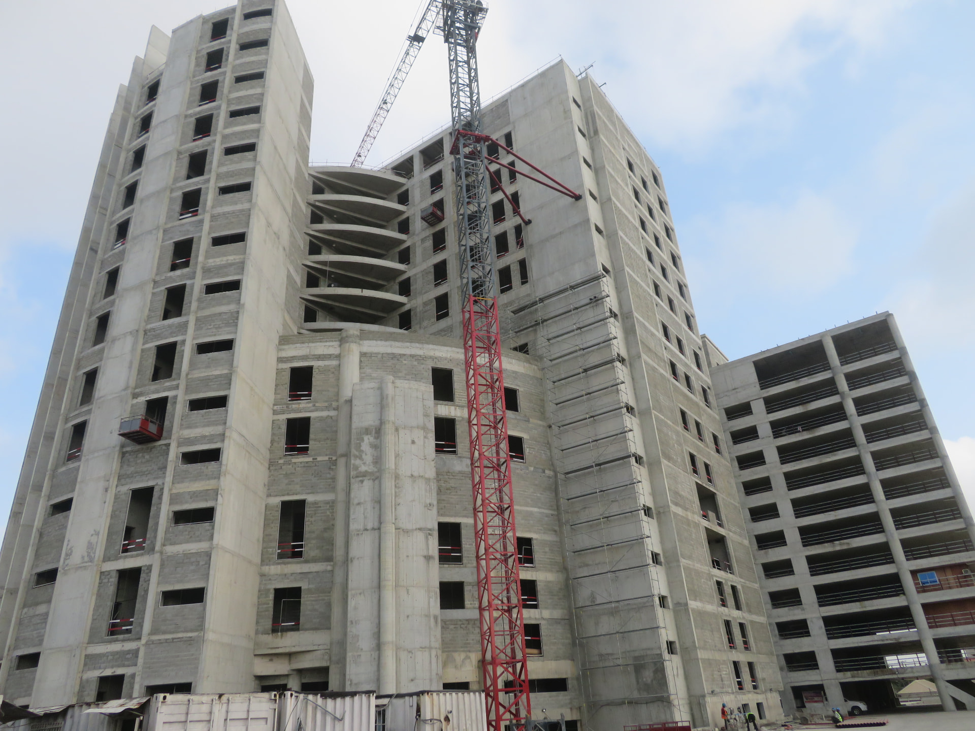 High-rise construction site under waterproofing works